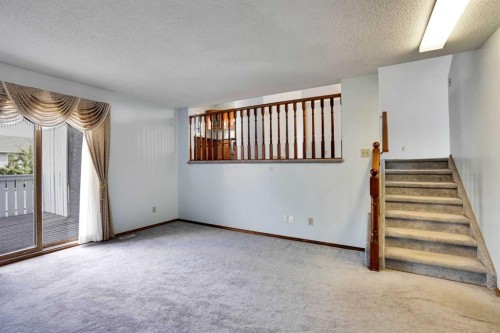 21 La Valencia Green Ne, Calgary, AB - Indoor Photo Showing Other Room