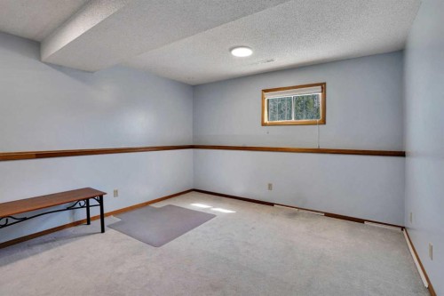 21 La Valencia Green Ne, Calgary, AB - Indoor Photo Showing Other Room