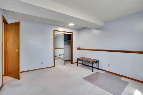 21 La Valencia Green Ne, Calgary, AB - Indoor Photo Showing Other Room