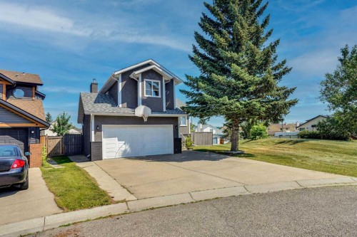 21 La Valencia Green Ne, Calgary, AB - Outdoor With Facade