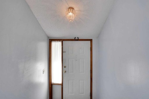 21 La Valencia Green Ne, Calgary, AB - Indoor Photo Showing Other Room
