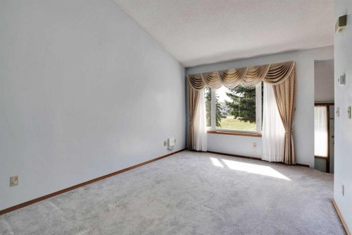 21 La Valencia Green Ne, Calgary, AB - Indoor Photo Showing Other Room