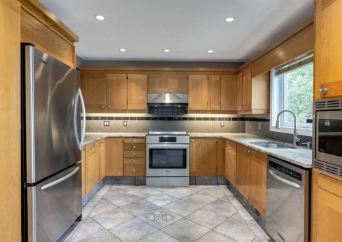 111 Hawksbrow Drive Nw, Calgary, AB - Indoor Photo Showing Kitchen With Double Sink
