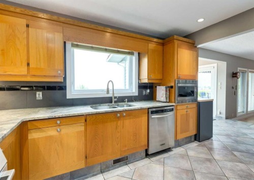 111 Hawksbrow Drive Nw, Calgary, AB - Indoor Photo Showing Kitchen With Double Sink