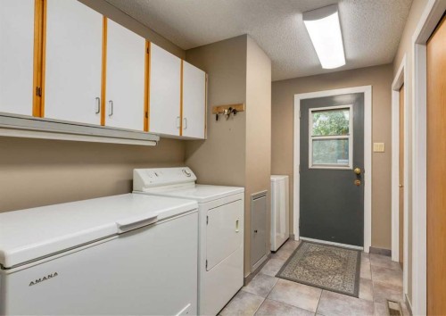 111 Hawksbrow Drive Nw, Calgary, AB - Indoor Photo Showing Laundry Room