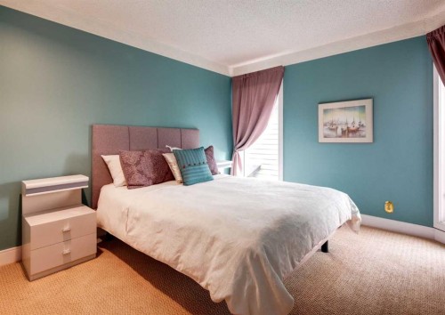 111 Hawksbrow Drive Nw, Calgary, AB - Indoor Photo Showing Bedroom