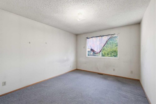 56 Pinecliff Close Ne, Calgary, AB - Indoor Photo Showing Other Room