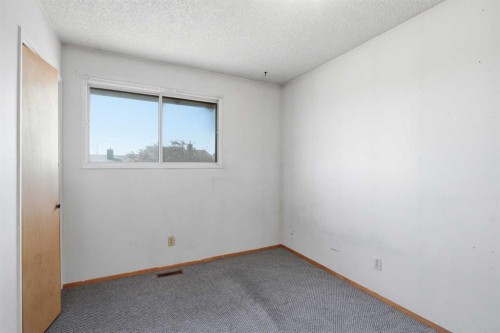 56 Pinecliff Close Ne, Calgary, AB - Indoor Photo Showing Other Room