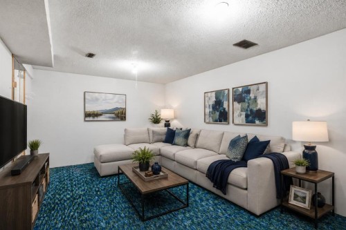 56 Pinecliff Close Ne, Calgary, AB - Indoor Photo Showing Living Room
