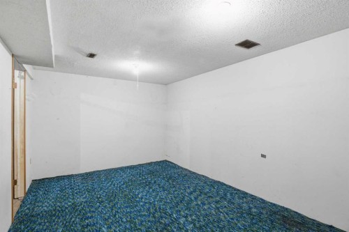 56 Pinecliff Close Ne, Calgary, AB - Indoor Photo Showing Other Room