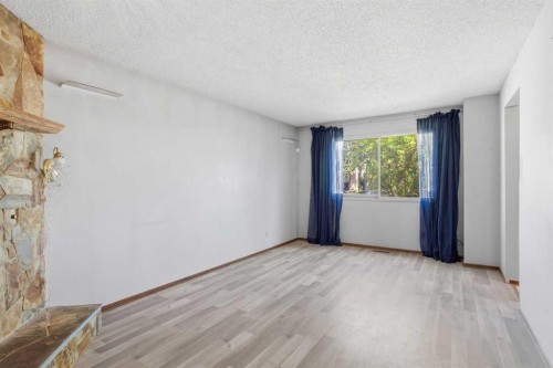 56 Pinecliff Close Ne, Calgary, AB - Indoor Photo Showing Other Room