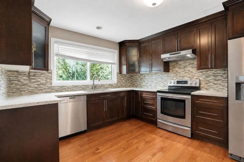 5748 Dalmead Crescent Nw, Calgary, AB - Indoor Photo Showing Kitchen With Upgraded Kitchen