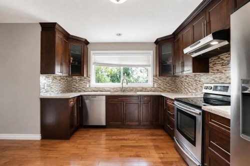 5748 Dalmead Crescent Nw, Calgary, AB - Indoor Photo Showing Kitchen With Upgraded Kitchen
