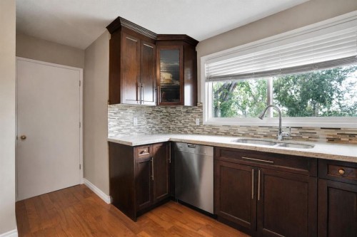 5748 Dalmead Crescent Nw, Calgary, AB - Indoor Photo Showing Kitchen With Double Sink