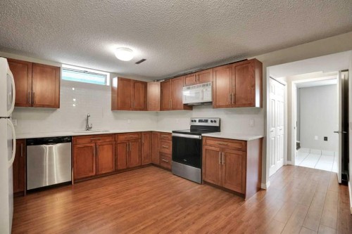 5748 Dalmead Crescent Nw, Calgary, AB - Indoor Photo Showing Kitchen