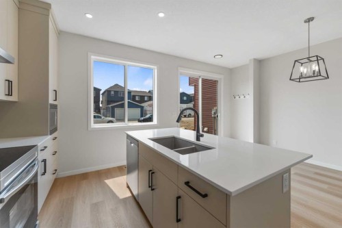 247 Lucas Gate Nw, Calgary, AB - Indoor Photo Showing Kitchen With Double Sink