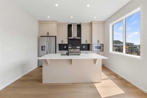 247 Lucas Gate Nw, Calgary, AB - Indoor Photo Showing Kitchen With Upgraded Kitchen