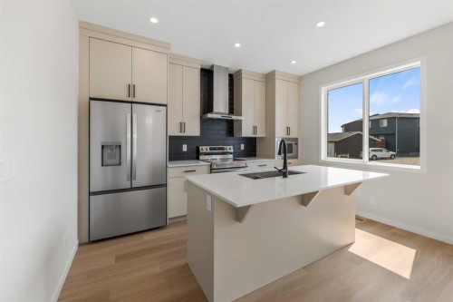 247 Lucas Gate Nw, Calgary, AB - Indoor Photo Showing Kitchen With Upgraded Kitchen