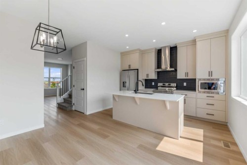 247 Lucas Gate Nw, Calgary, AB - Indoor Photo Showing Kitchen With Upgraded Kitchen
