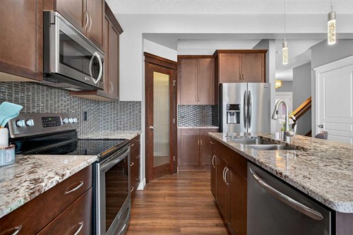 47 Evanscrest Way Nw, Calgary, AB - Indoor Photo Showing Kitchen With Double Sink With Upgraded Kitchen