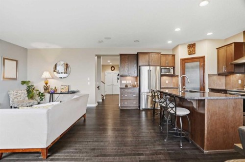 113 Sunset View, Cochrane, AB - Indoor Photo Showing Kitchen With Stainless Steel Kitchen With Upgraded Kitchen