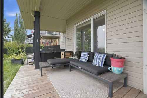 113 Sunset View, Cochrane, AB - Outdoor With Deck Patio Veranda With Exterior