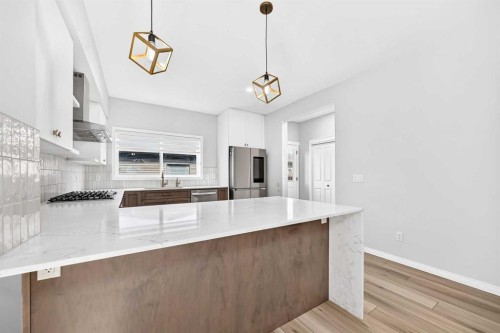 856 Midtown Drive Sw, Airdrie, AB - Indoor Photo Showing Kitchen