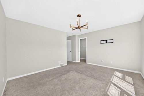 856 Midtown Drive Sw, Airdrie, AB - Indoor Photo Showing Other Room