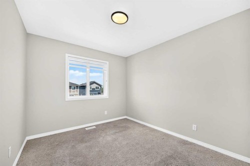 856 Midtown Drive Sw, Airdrie, AB - Indoor Photo Showing Other Room