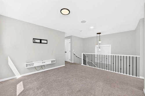 856 Midtown Drive Sw, Airdrie, AB - Indoor Photo Showing Other Room