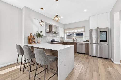 856 Midtown Drive Sw, Airdrie, AB - Indoor Photo Showing Kitchen With Stainless Steel Kitchen With Upgraded Kitchen