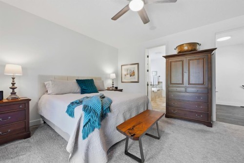 8 Cimarron Estates Gate, Okotoks, AB - Indoor Photo Showing Bedroom