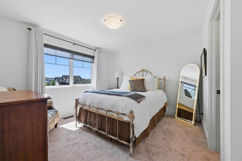8 Cimarron Estates Gate, Okotoks, AB - Indoor Photo Showing Bedroom