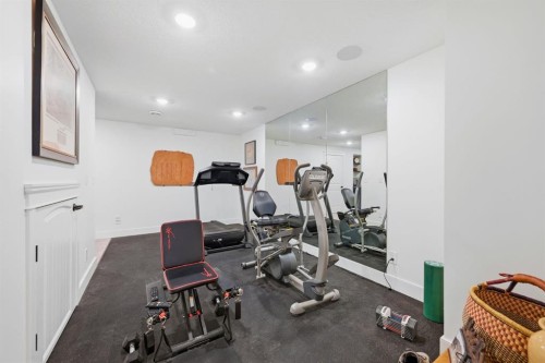 8 Cimarron Estates Gate, Okotoks, AB - Indoor Photo Showing Gym Room