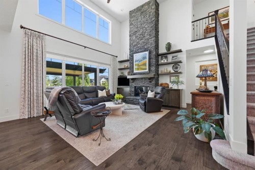 8 Cimarron Estates Gate, Okotoks, AB - Indoor Photo Showing Living Room With Fireplace
