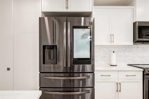 23 Sussex Crescent Sw, Calgary, AB - Indoor Photo Showing Kitchen With Stainless Steel Kitchen With Upgraded Kitchen