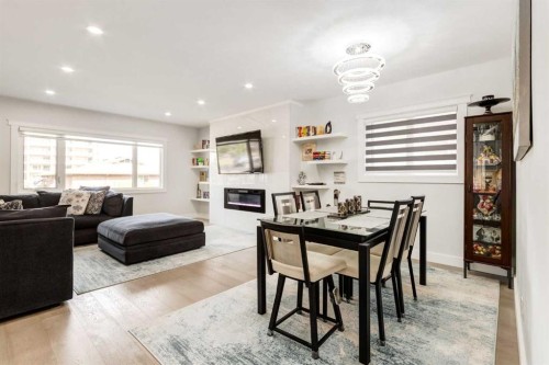 23 Sussex Crescent Sw, Calgary, AB - Indoor With Fireplace