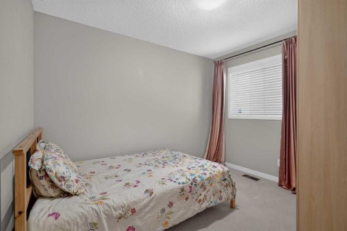 189 Bridleridge View Sw, Calgary, AB - Indoor Photo Showing Bedroom