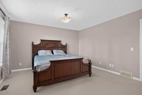 189 Bridleridge View Sw, Calgary, AB - Indoor Photo Showing Bedroom