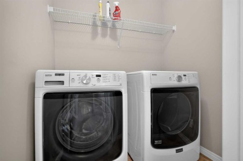 189 Bridleridge View Sw, Calgary, AB - Indoor Photo Showing Laundry Room