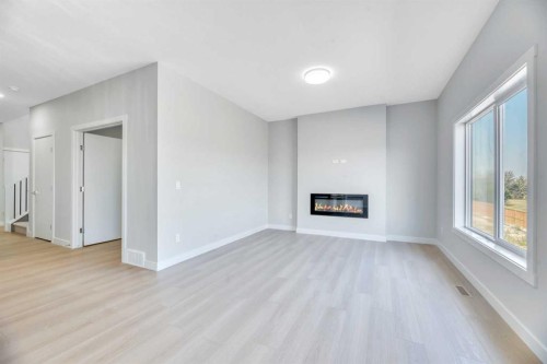 154 Lakewood Crescent, Strathmore, AB - Indoor With Fireplace