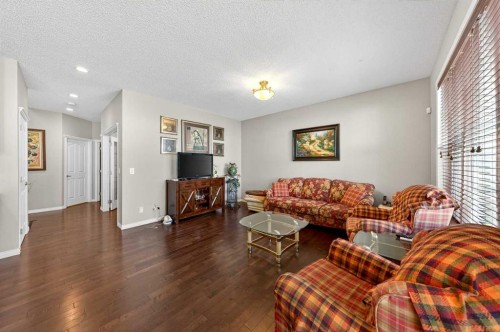 27 Panatella Row Nw, Calgary, AB - Indoor Photo Showing Living Room
