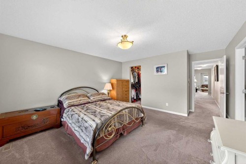27 Panatella Row Nw, Calgary, AB - Indoor Photo Showing Bedroom