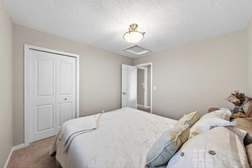 27 Panatella Row Nw, Calgary, AB - Indoor Photo Showing Bedroom