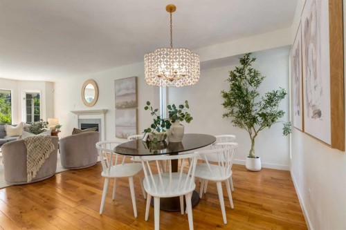 2218 3 Avenue Nw, Calgary, AB - Indoor Photo Showing Dining Room With Fireplace