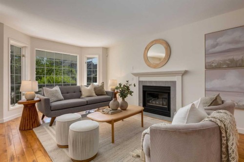 2218 3 Avenue Nw, Calgary, AB - Indoor Photo Showing Living Room With Fireplace
