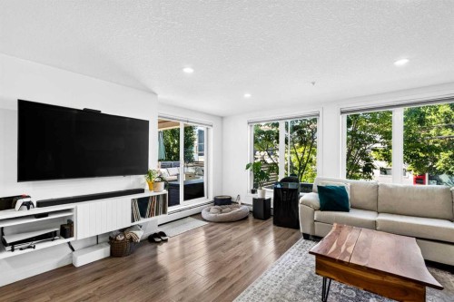 103-1920 11 Avenue Sw, Calgary, AB - Indoor Photo Showing Living Room
