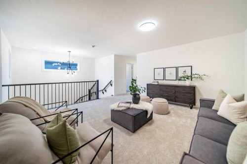 168 Creekstone Circle Sw, Calgary, AB - Indoor Photo Showing Living Room