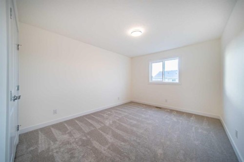 168 Creekstone Circle Sw, Calgary, AB - Indoor Photo Showing Other Room
