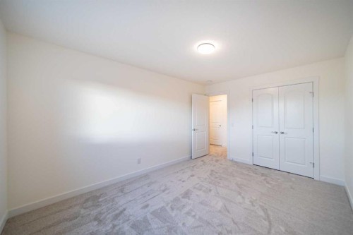 168 Creekstone Circle Sw, Calgary, AB - Indoor Photo Showing Other Room